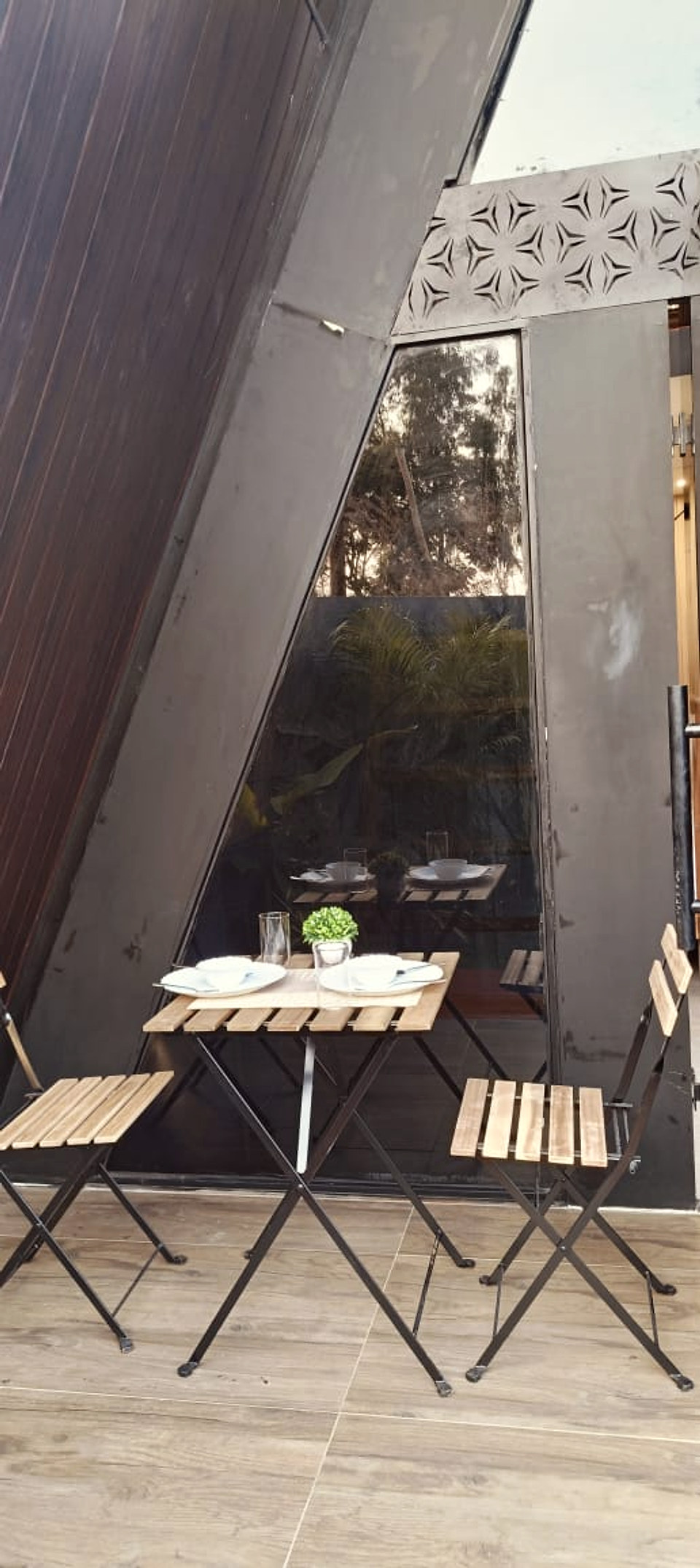 Outdoor dining table on the cottage deck